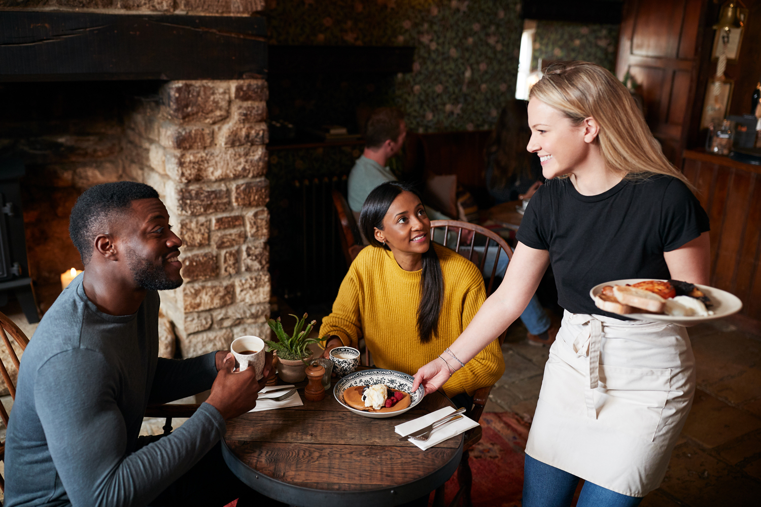 waitress serving food